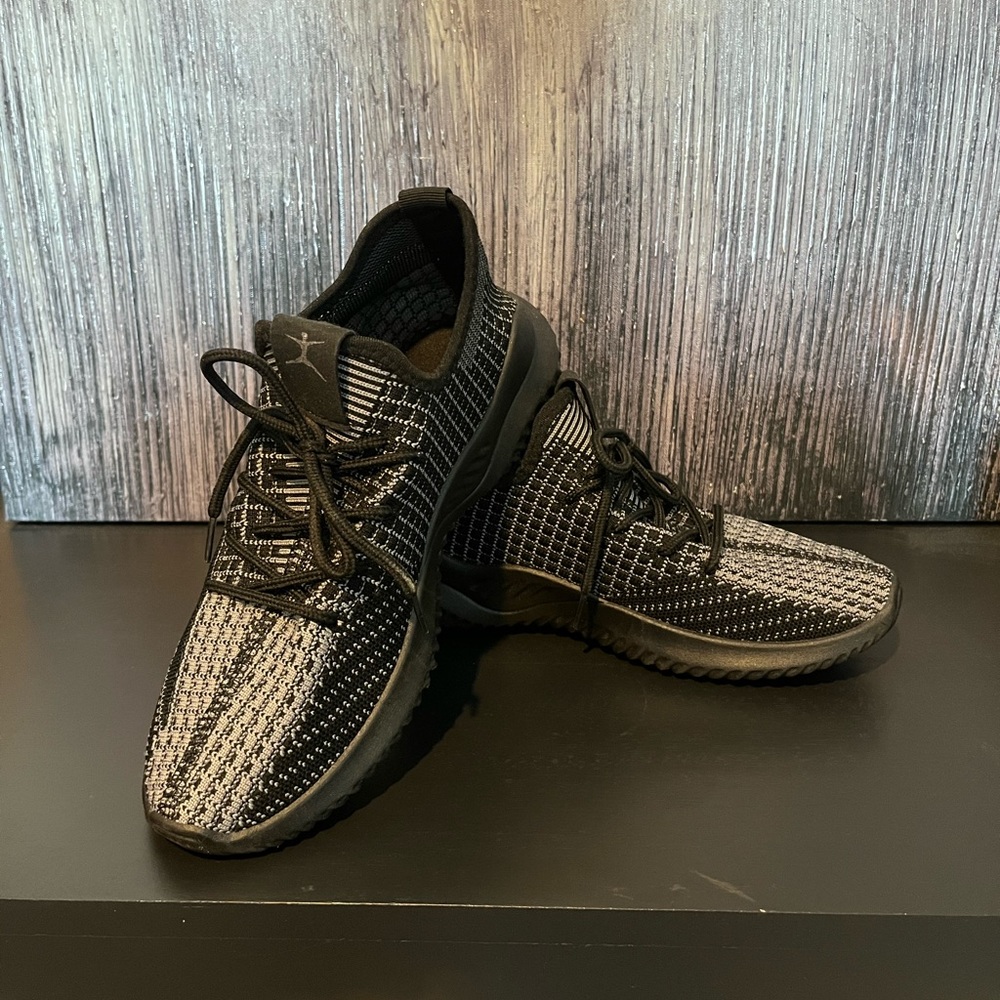 Sleek Black Sneakers with Knit Design